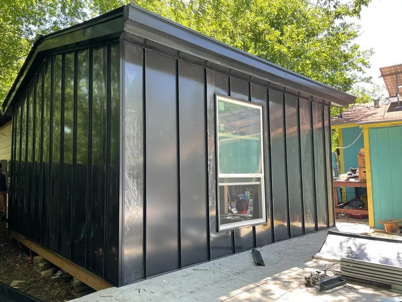 Black standing seam metal wall panels for Roof Inspection in Flowery Branch